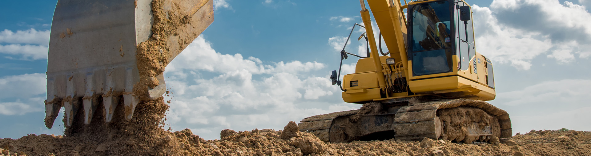 Excavator working on building site