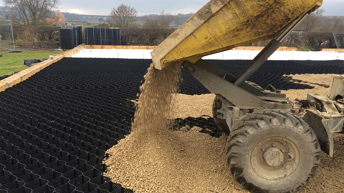 ProtectaWeb geocell being filled with gravel