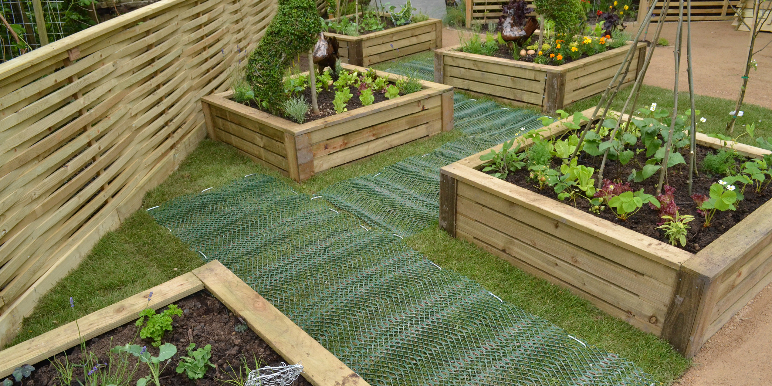 TurfMesh in use in a garden to protect high traffic areas