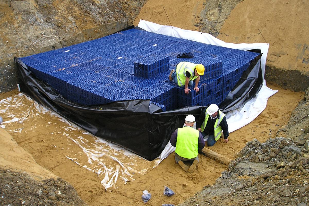 Step one: Attenuation tank crates are laid within the geotextile & geomembrane 