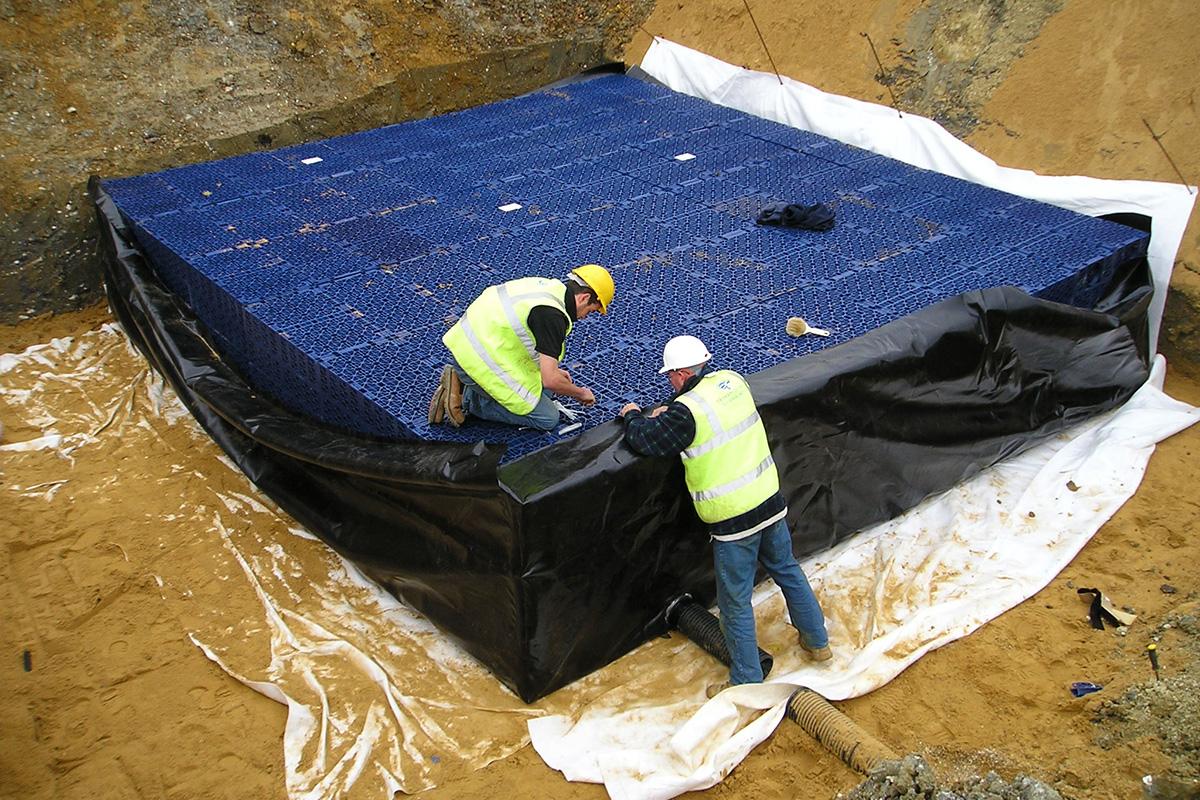 Step two: The crates are wrapped in the geomembrane layer