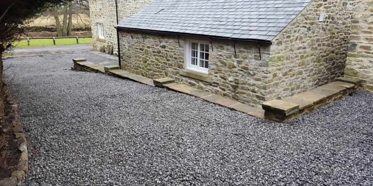 A gravel driveway made with Ecodeck