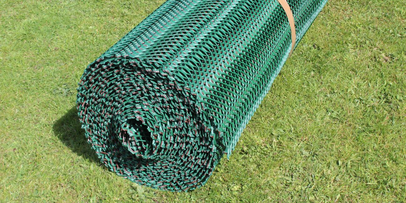 A roll of TurfMesh ready to be rolled out