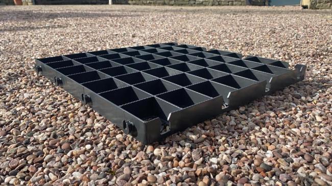 Ecodeck panel lying on a gravel surface